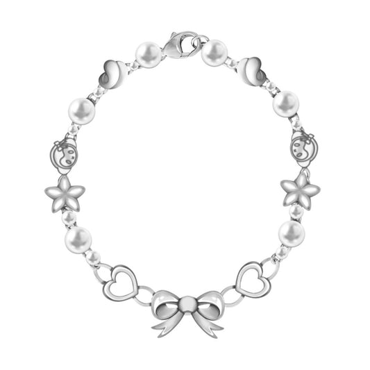 "COQUETTE" CHARM BRACELET