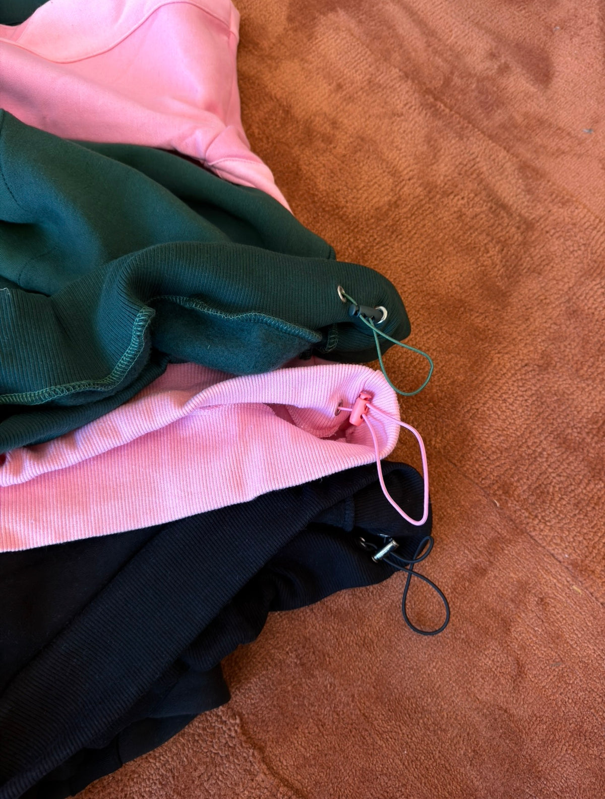 “Paneled” Green Cinch Hoodie